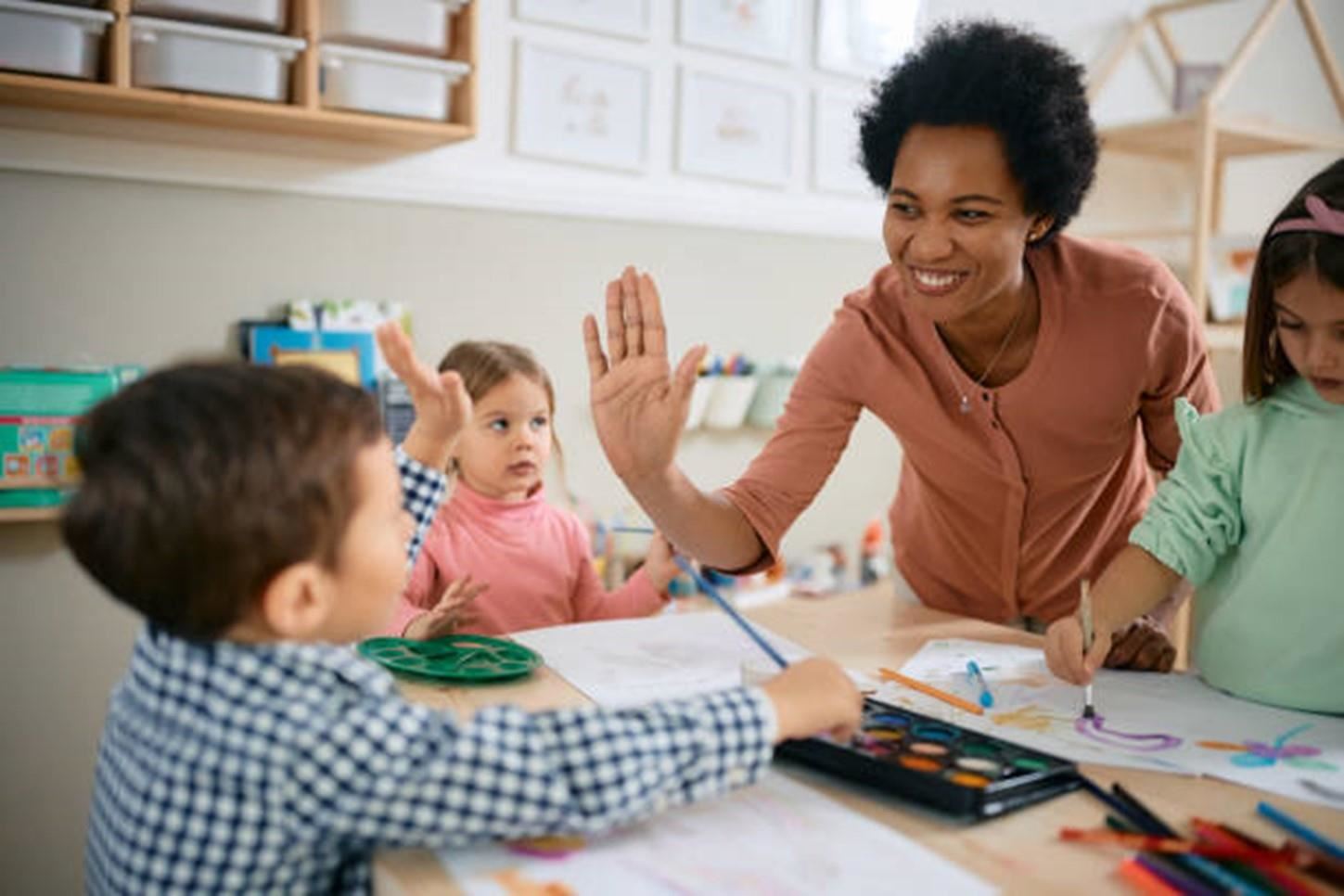 Teacher and PreK students